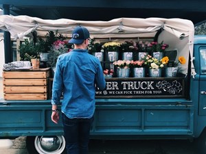 Man_Picking_Mothers_Day_Flowers_to_be_Delivered